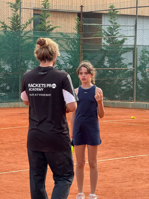 adult playing tennis at Rackets Pro