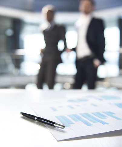 Documents and Blurred Business Men
