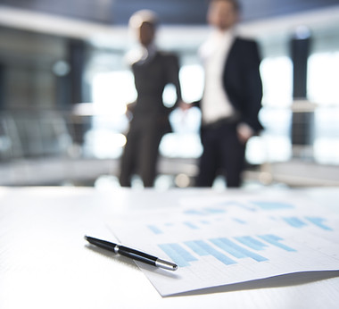 Documents and Blurred Business Men