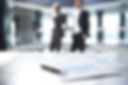 Documents and Blurred Business Men