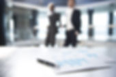 Documents and Blurred Business Men