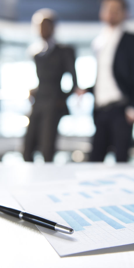 Documents and Blurred Business Men