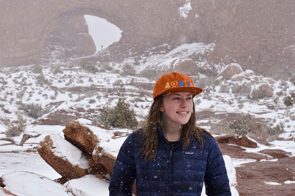 Katie Randall smiling outdoors in a snowy setting