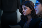 Female employe looking at computer screen