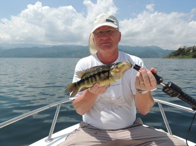 PHOTO BY LINDA VOORTMAN Down in Costa Rica, Hudsonite Ozzie Voortman catches his first ever rainbow bass, as opposed to rainbow trout, which he gave to his guide for supper.