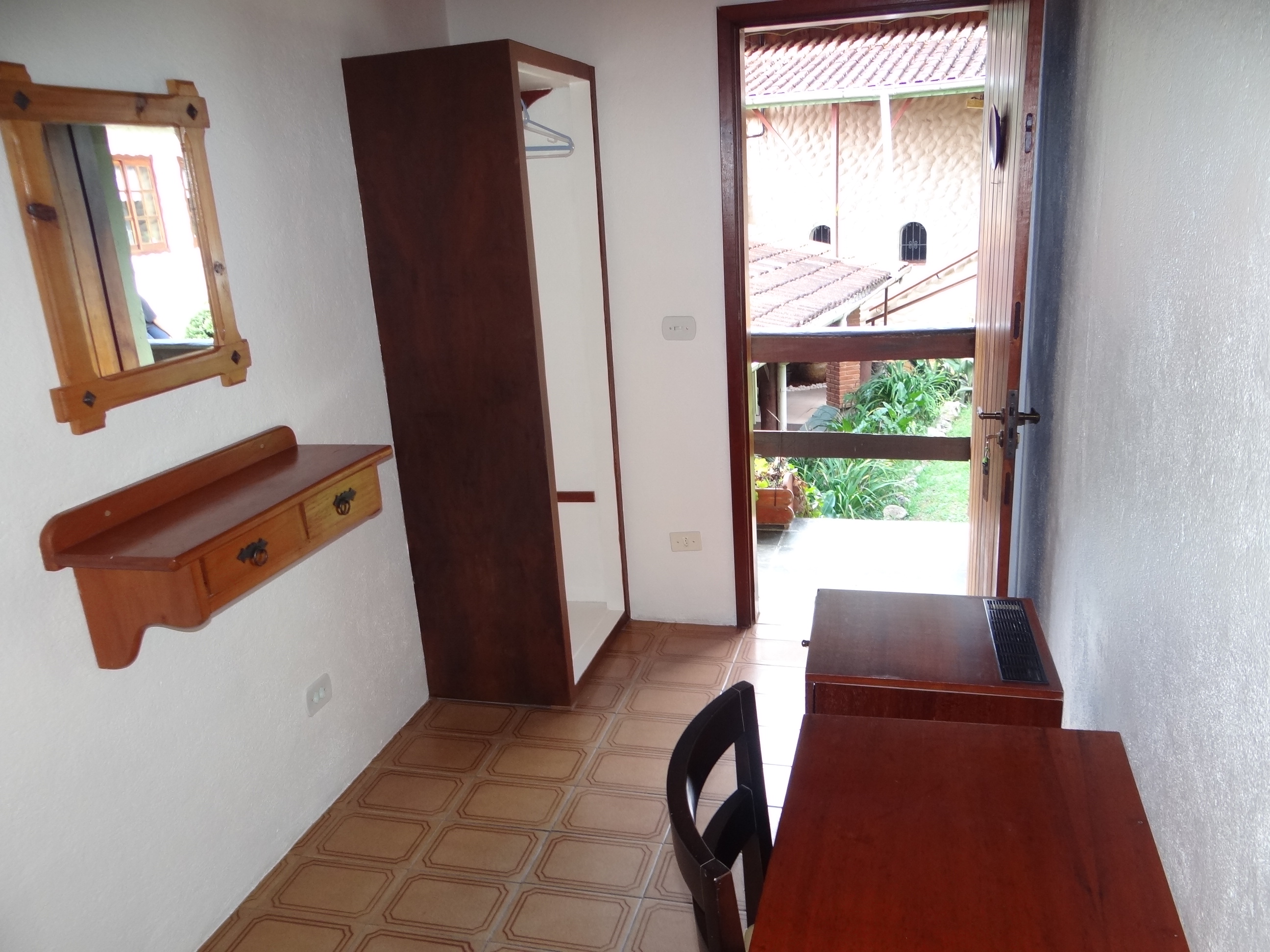 Suíte Comfort com Varanda Violeta