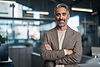 happy-middle-aged-older-business-man-looking-at-ca-2024-02-19-14-37-01-utc.jpg