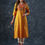 Thumbnail: Yellow Lehriya Hand Embroidered Kurta for Women with Mirror Work 