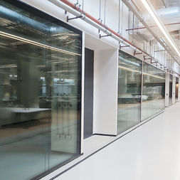 Acoustic Glass Partitions for Innovation Campuses: Privacy Meets Collaboration