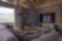 Luxus Chalet Verbier Wohnzimmer Kamin.png
