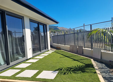 Artifical lawn Nelson, artifical grass with pavers Tasman