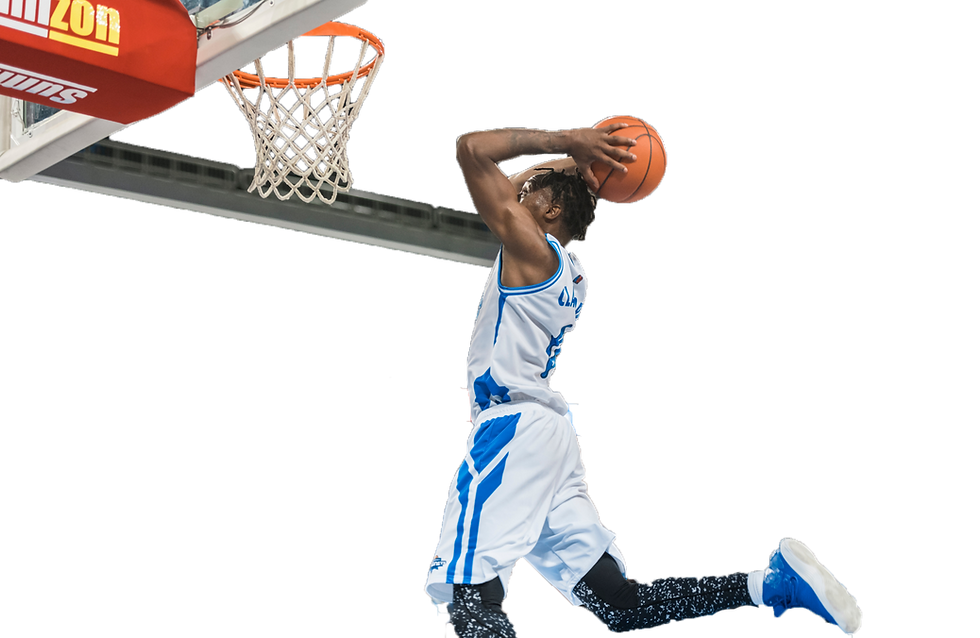 Basketball player scoring slam dunk