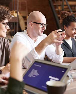 photo-of-people-looking-on-laptop-318280
