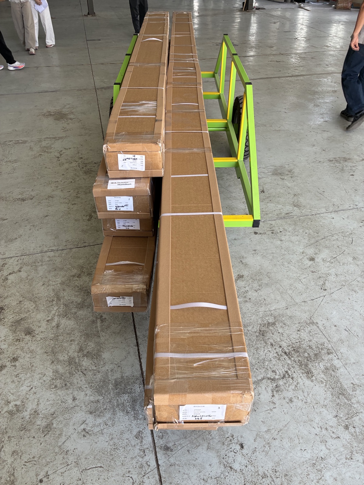 Pergola components wrapped and packed on the factory floor