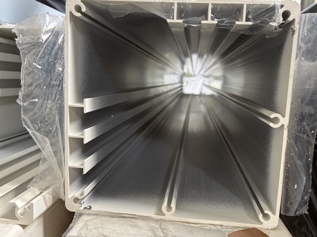 Looking down the inside of a Summit Series II post at the factory, with aluminum ribs running along its inner walls