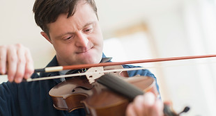 Man with Down Syndrome Playing Violin