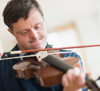Man with Down Syndrome Playing Violin