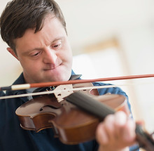 Man with Down Syndrome Playing Violin