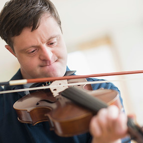 Man with Down Syndrome Playing Violin