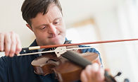 Man with Down Syndrome Playing Violin