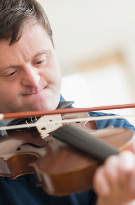 Man with Down Syndrome Playing Violin
