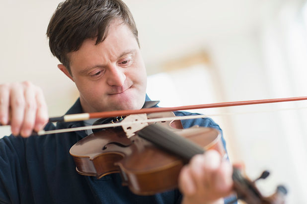 Man with Down Syndrome Playing Violin