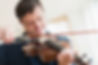 Man with Down Syndrome Playing Violin