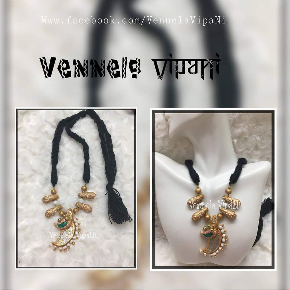 Gold terracotta clay elephant tooth shaped pendant with cotton cord