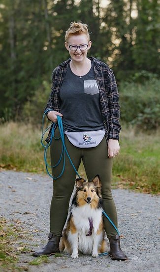 Kaeli Grotz owner Fluff in the Forest Dog Training on the trail with her sheltie Freya