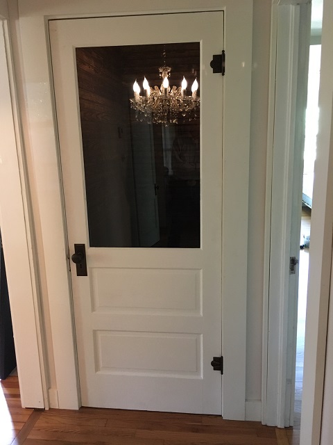 Door remodel from panel to glass