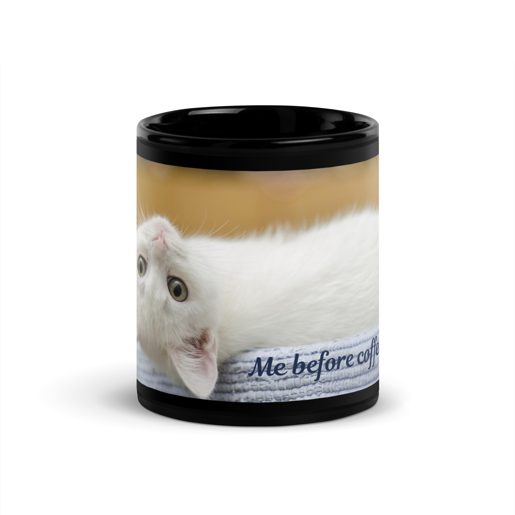 High gloss black mug featuring a fluffy white cat with tired eyes and the phrase 'Me before coffee'