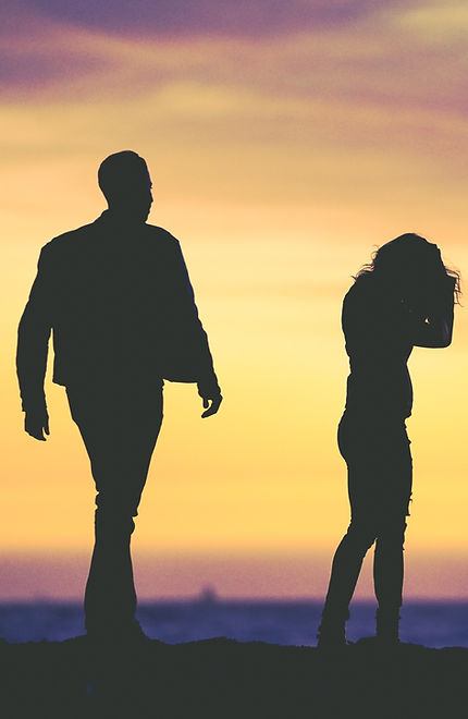 silhouette of man and woman under yellow sky_edited.jpg