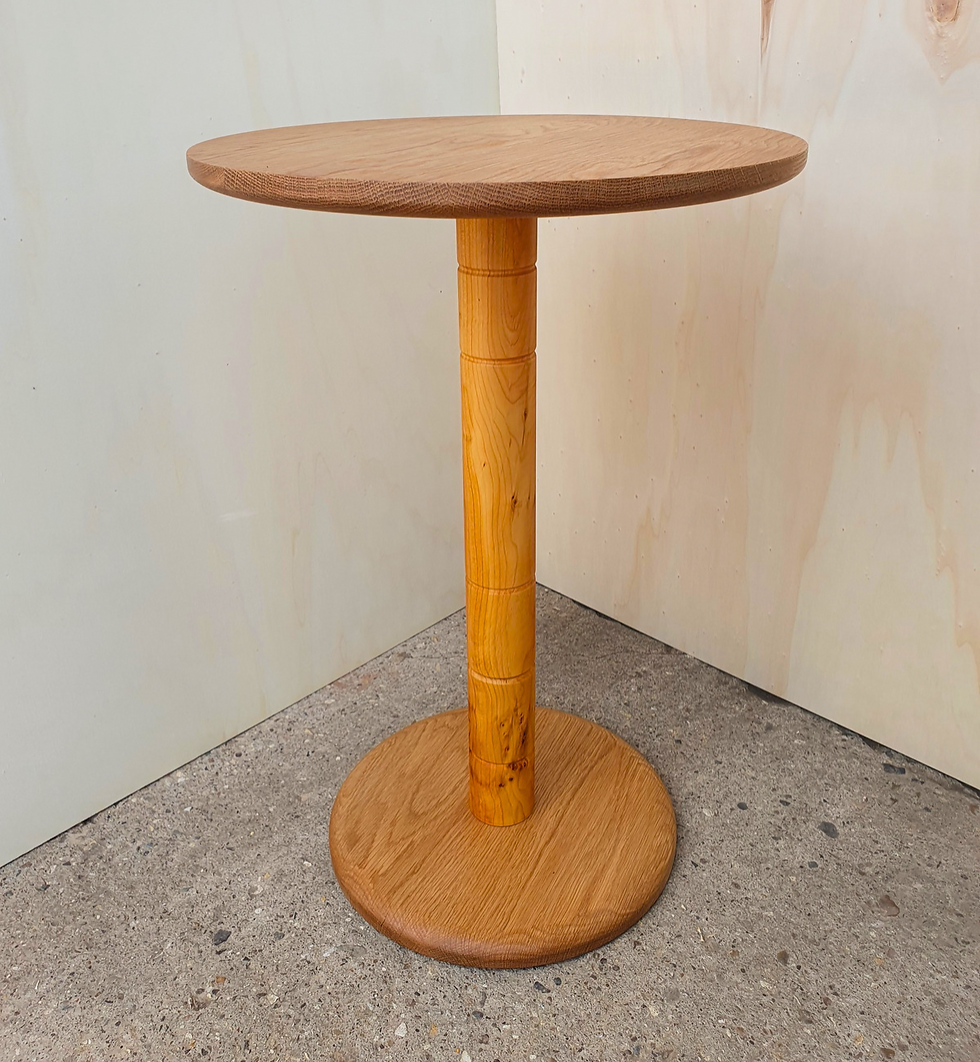 Thumbnail: Side Table made from a turned Cedar central spindle, with Oak top and base. Handmade in Northamptonshire UK.