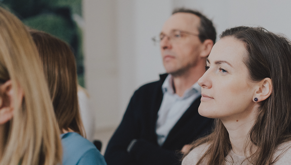 Woman and man listening attentively