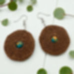 Dark brown crochet earrings with turquoise and amber rain flower stone bead and silver hook.