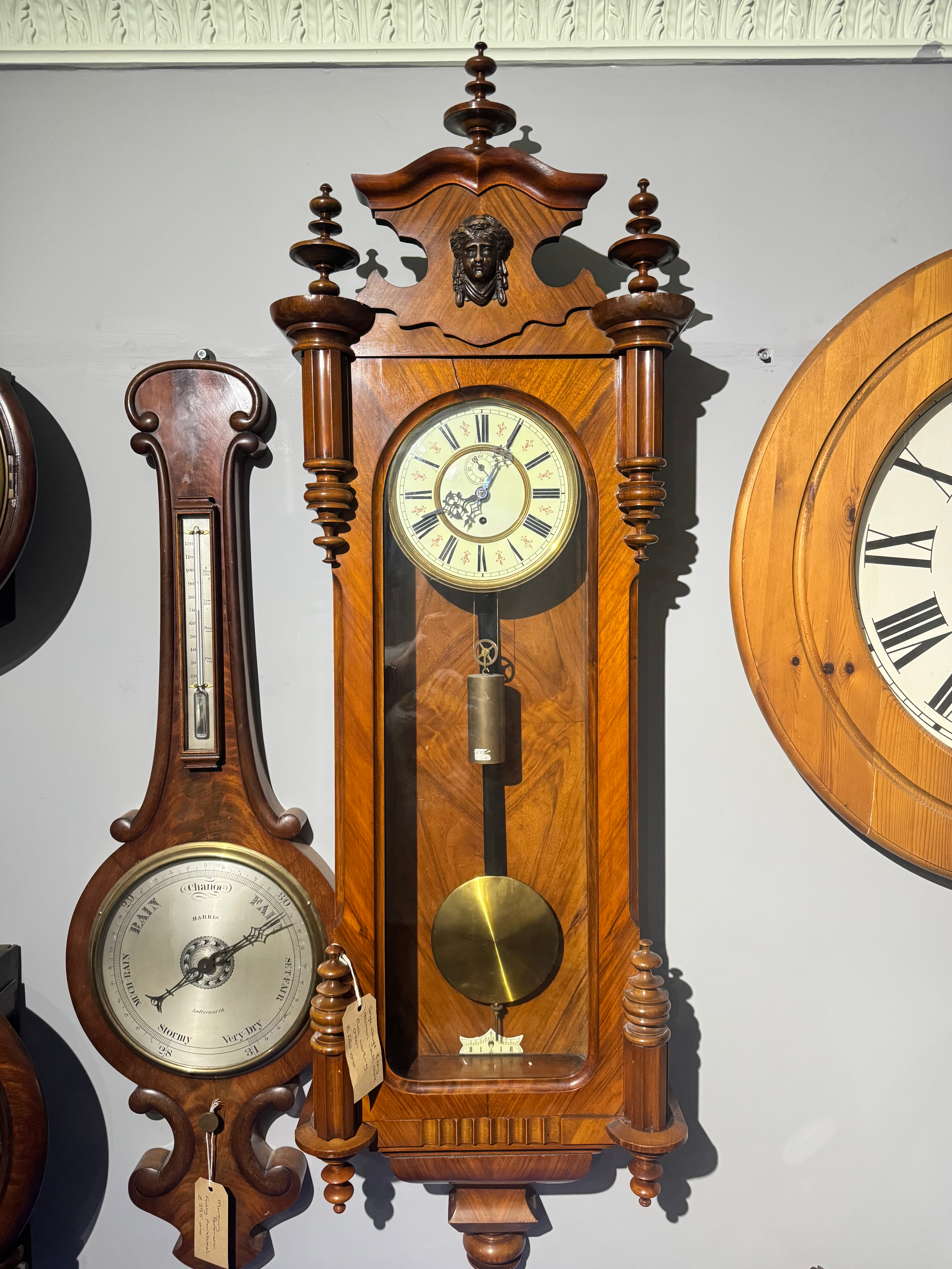 Walnut single weight German wall clock.