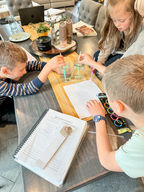 Homeschool children conducting a science experiment