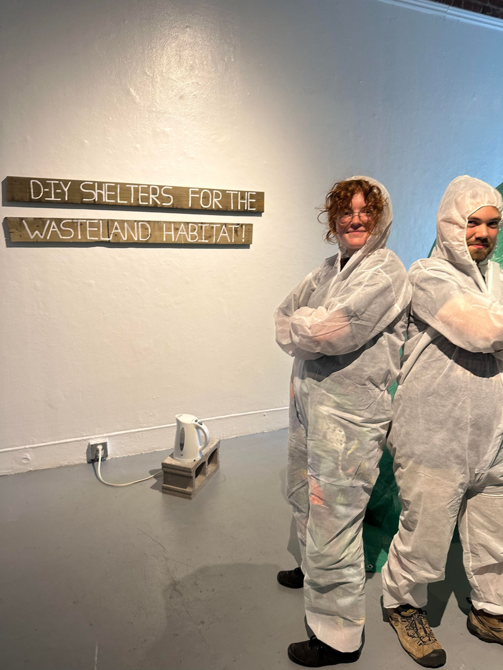 Melanie and Lachlan posing during the exhibition