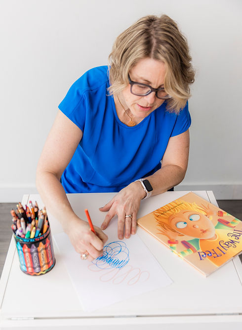 Registered Psychotherapist (Qualifying) Tara Gratto using a picture book and art as bibliotherapy tools for child emotional regulation