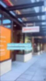 Fitness studio storefront with new product available announcement
