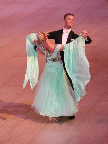 Professional couple classical sequence dancing at a competition.