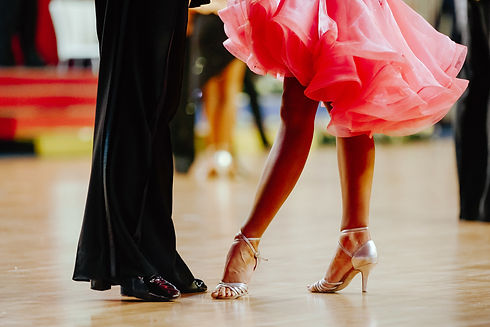Stance of dancers, woman and man latino dancing.