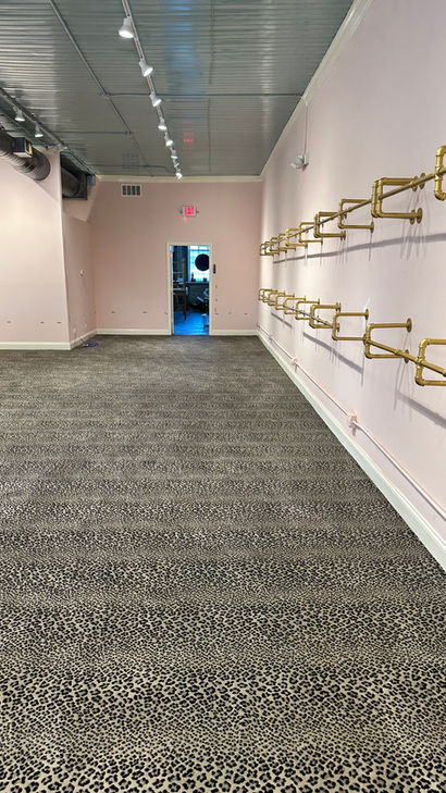 Elevated Retail Space Product Wall Brackets Werner General Contracting Lake Forest IL