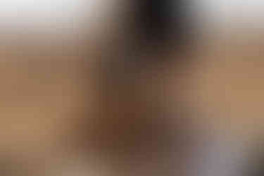 Newlywed Bride on safari honeymoon . Close up of hair blowing in the wind while driving through the bush