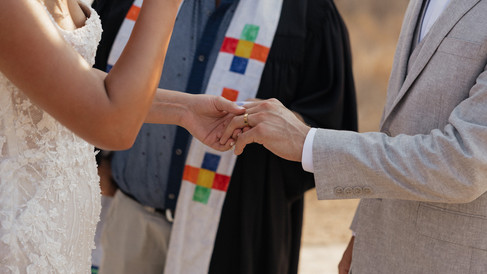 Bride and Groom exchange rings during Elopement Ceremony at Klaserie Drift Safari Camp in Hoedspruit South Africa