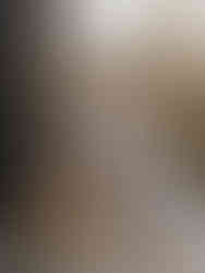 Groom enjoying a quiet moment and a drink while sitting on the deck during safari elopement in South Africa