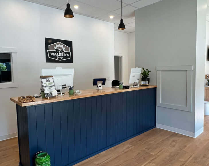 Blue service counter, bright and airy check in desk.
