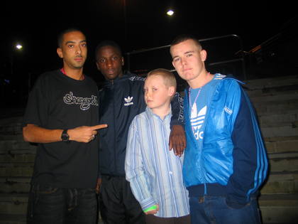 4 males posing for a promotional photo