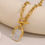 Thumbnail: Two-Tone Sun & Moon T-Bar Necklace