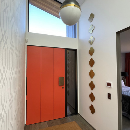 Art adding pop to this entryway.